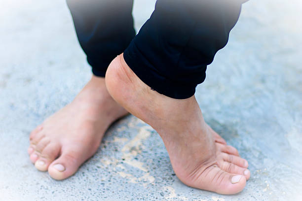 istock Human legs Performing Yoga/Dance 611307950