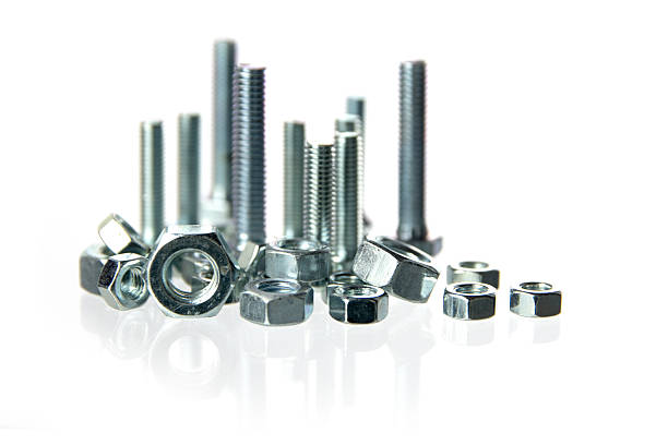 istock nuts and bolts standing like a skyline on white 611308598