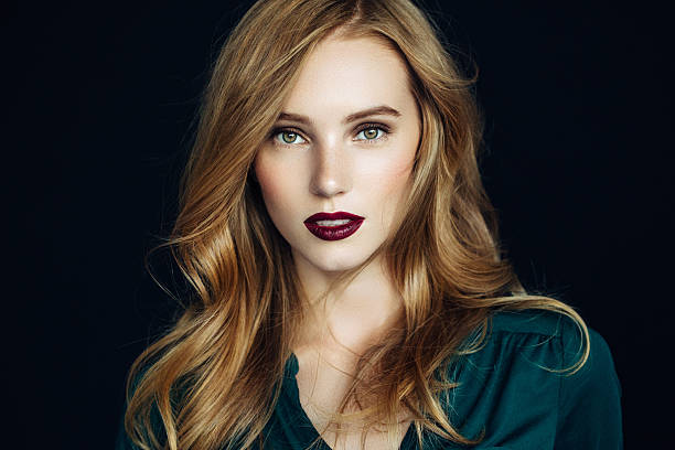 Studio shot of young beautiful woman