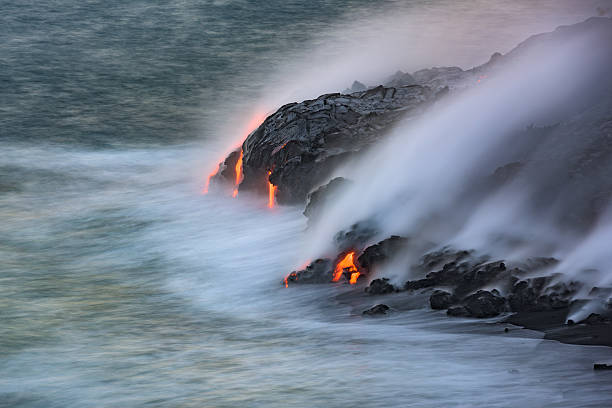 istock Volcanic eruptions flowing into the Pacific ocean 611311168