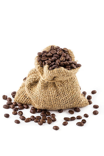 istock coffee beans in bag isolated on white background 611311318