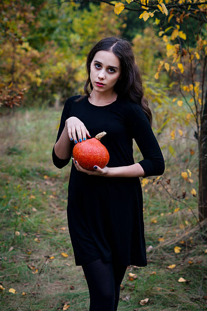istock Autumn halloween girl 611312980