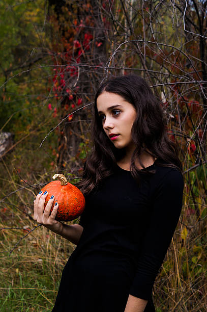 istock Autumn halloween girl 611313684