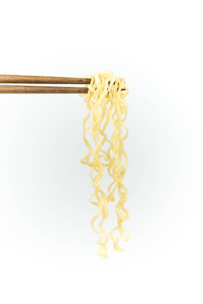 istock chopsticks noodles isolated on white background 611314192