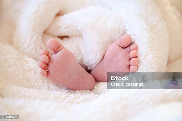 Feets Of Little Baby Stock Photo - Download Image Now - Baby - Human Age, Blanket, Newborn