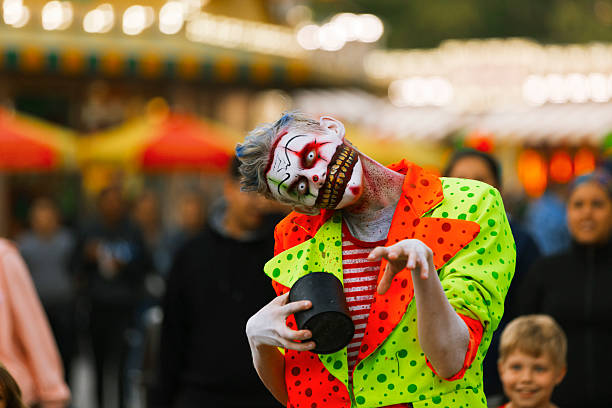 Jackson, United States - September 24, 2016: Street performer in Halloween costume and makeup is entertaining crowds.