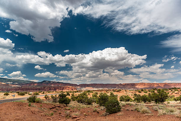 istock Summer Clouds in Southern Utah Sky 611316568