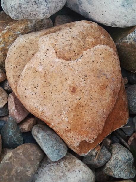 istock Full Frame Maine Beach Heart Shape Rocks, Acadia National Park 611316574
