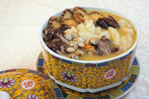 istock Mushroom soup in chinese bowl on black background 611317748