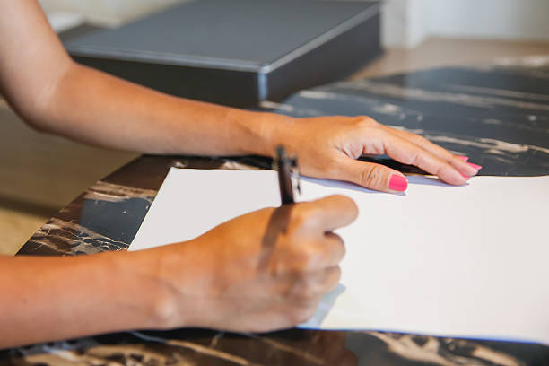 istock Business woman writing a letter 611318258