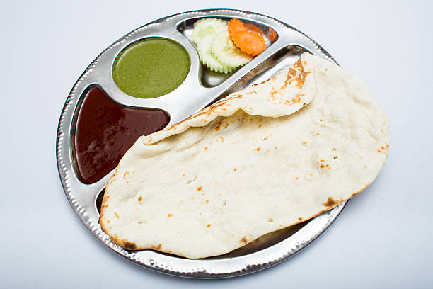 istock Indian tray meal with bread and sauce 611318926