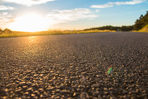 istock Rural road in the sunset 611320028