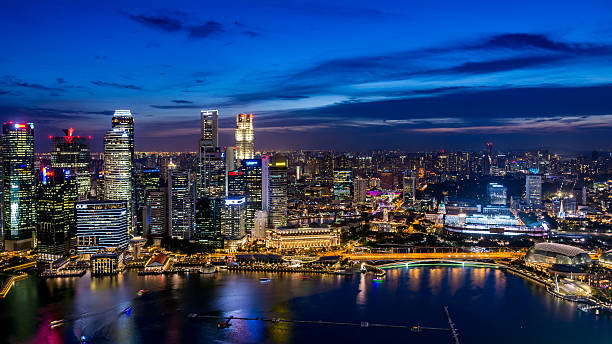 istock Singapore's financial district at night 611320772