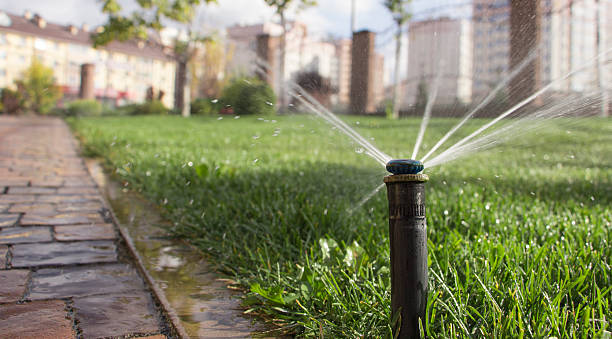 istock nozzle automatic watering system against a background of green g 611321514