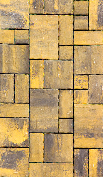 istock Orange Concrete pavers pattern for advertising close-up 611322948