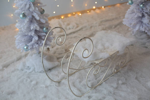 istock Christmas tree with blue and white toys in the interior 611325006