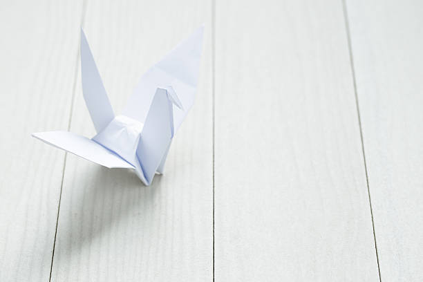 istock Origami paper bird 611330522