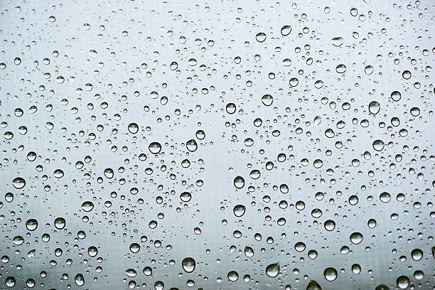 Detail of raindrops Detail of raindrops on the windowpane toilet bowl stock pictures, royalty-free photos & images