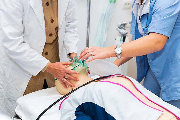 istock First aid CPR seminar,mechanical ventilation of dummy 611334750