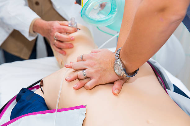 istock CPR seminar,mechanical ventilation and heart massage of CPR dummy 611335054