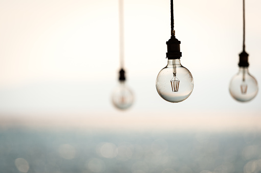 Light bulb hanging on the blured background