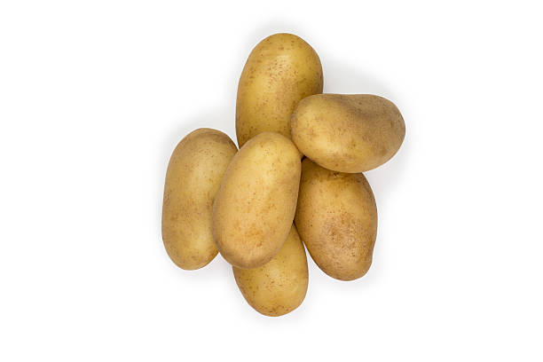 istock Group of potatoes isolated on white 611590460