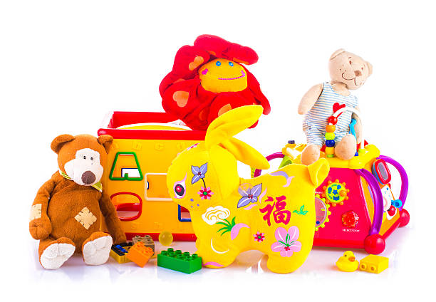 istock Children multicolored toys on bright yellow background 611592982