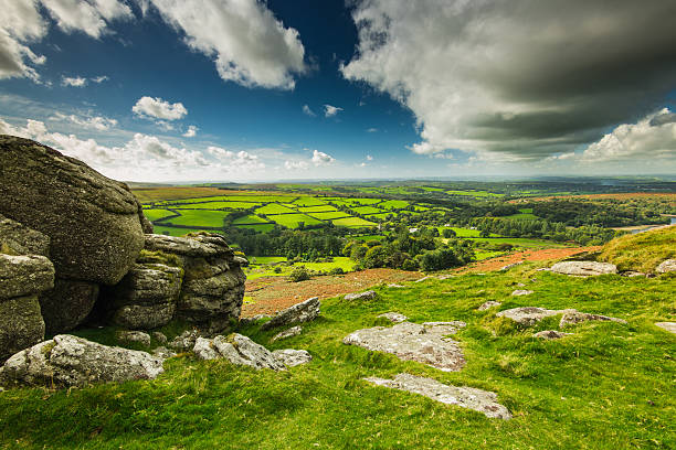 Panoramic wide view from Dartmoor Tor Panoramic wide view from Dartmoor Tor, dramatic sky and autumn colors dartmoor photos stock pictures, royalty-free photos & images