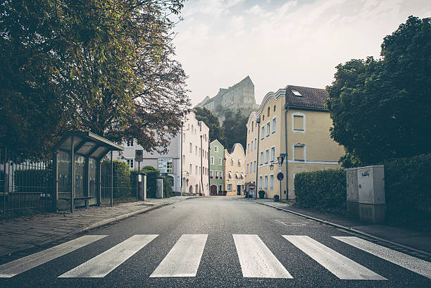 Burghausen in altötting germany early morning Burghausen, a small in upper bavaria town at the border to upper austria. In the background, the longest castle of the world. zebra crossing photos stock pictures, royalty-free photos & images