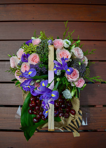 istock basket of flowers and cherry top view 611594470