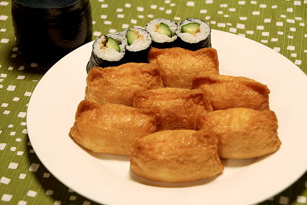 istock pouch of fried bean curd stuffed with vinegared rice(inarizushi) 611594564