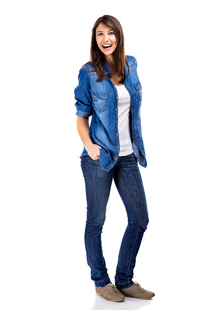 istock Beautiful woman with hands on the pockets and smiling 611596476