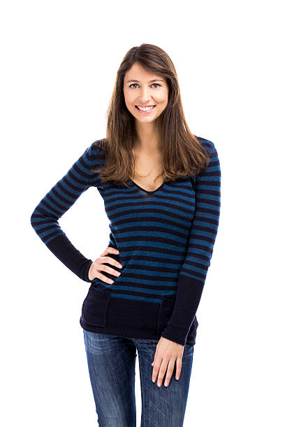 istock Beautiful woman smiling and standing over a white background 611596640