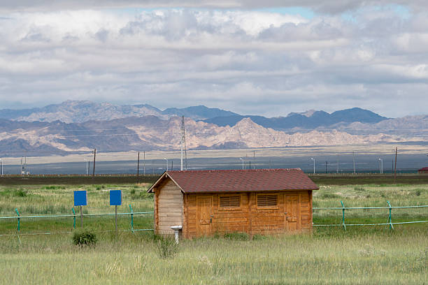 istock farmhouse on grassland 611598332
