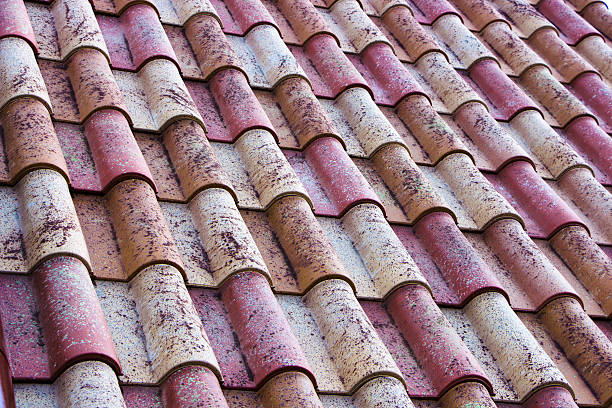 istock Metal tile roof useful for background or pattern 611598840