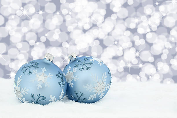 istock Christmas balls baubles stars background snow 611599352