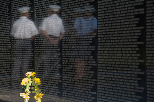 Washington DC. USA - September 25, 2016: Visitors at the Vietnam War Memorial