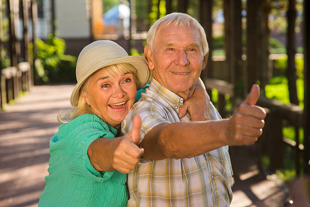 istock Elderly woman hugging man. 611600374