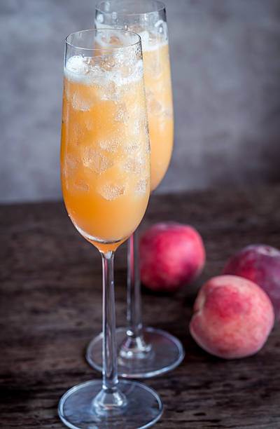 istock Two bellini cocktails with fresh peaches 611601242
