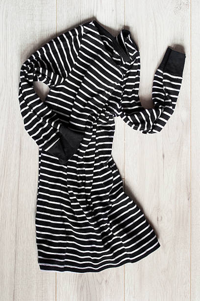 istock Dress on wooden background 611602180