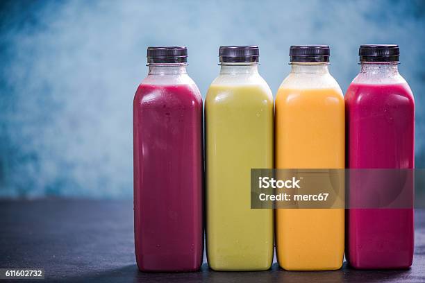 Colorful Smoothies In Plastic Bottles Stock Photo - Download Image Now - Detox, Juice - Drink, Protein Drink