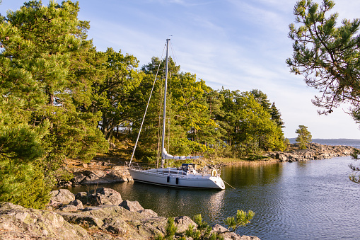 At anchor at one of the small rocky island in the Stockholm archipelago in Sweden