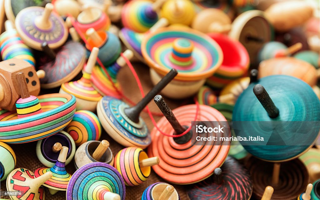 Spinning tops Artisanal wooden colorful spinning tops Spinning Top Stock Photo