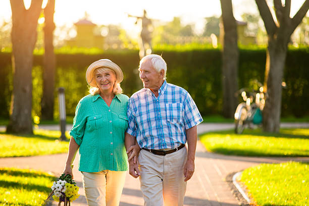 istock Elderly couple on nature background. 611603544