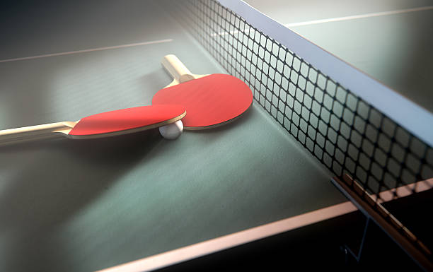 istock Table Tennis Table And Paddles 611605400