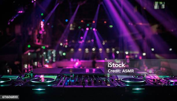 Dj Console Mixing Desk At A Night Club Stock Photo - Download Image Now - Nightclub, Disco Dancing, DJ