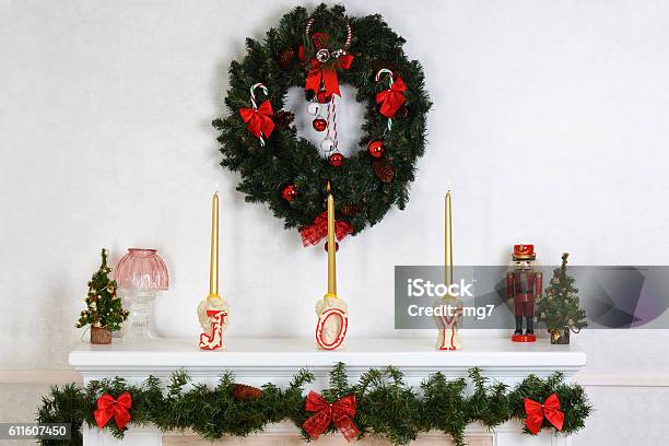 Closeup Fireplace Mantel With Wreath Stock Photo - Download Image Now - Christmas, Mantelpiece, Branch - Plant Part