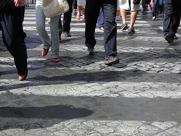 istock People crossing the street 611607852