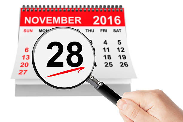 istock Cyber Monday Concept. 28 November 2016 calendar with magnifier 611610130