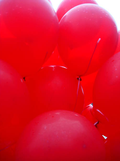 istock Cluster of Red Balloons 611610242